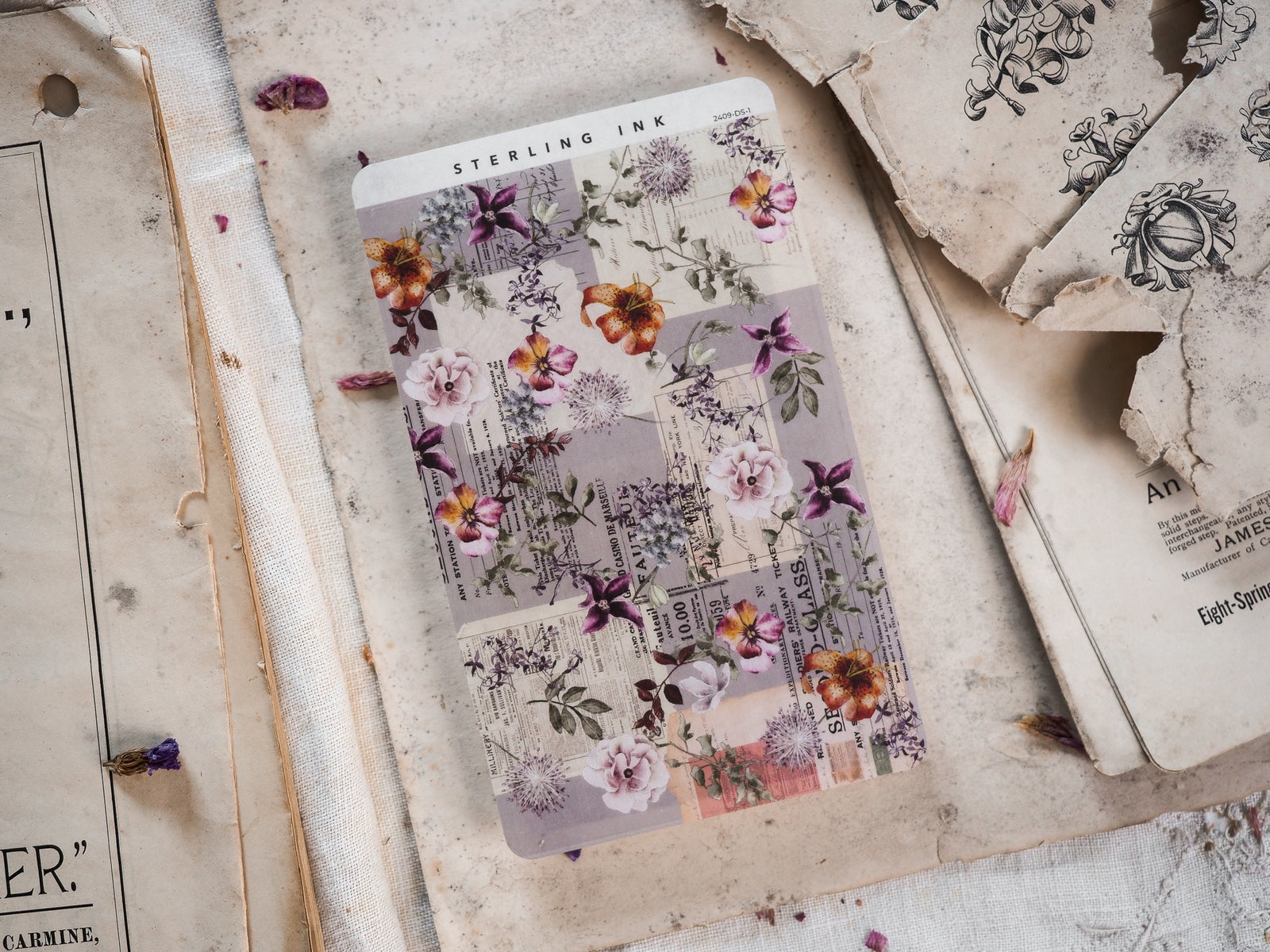 Vintage Deco Sheet - September 2024 featuring an elaborate, charming collage pattern of aged documents, scientific text, and delicate watercolor flowers.