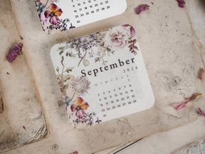 Botanical sticker calendar for September 2024, featuring soft watercolor roses, delicate greenery, and vintage floral designs.
