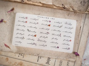 Sticker set featuring nine calendar labels with elegant calligraphy and accompanying floral designs, perfect for decorating daily journals or planners.