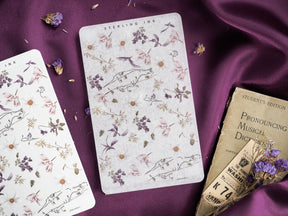 Delicate botanical strip stickers featuring a vintage pattern of soft watercolor blooms, leafy vines, and muted floral clusters.