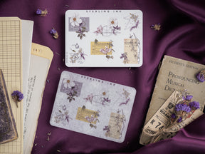 Detailed botanical stickers featuring intricate floral arrangements and printed designs with silver accents on a crisp white background.