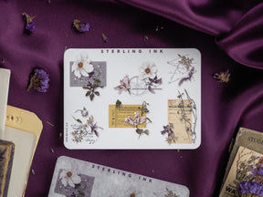 Vintage floral sticker set with botanical motifs, featuring pressed flowers, antique stamps, and aged paper designs with delicate silver foil accents.