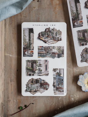 Set of white torn paper stickers featuring nostalgic, detailed illustrations of European street scenes, historic buildings, and charming outdoor café settings.