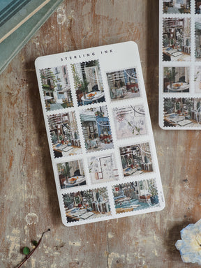 Vintage "Stamps Stickers - September 2025" sheet featuring a collection of charming, detailed architectural illustrations of European city streets and urban cafes.