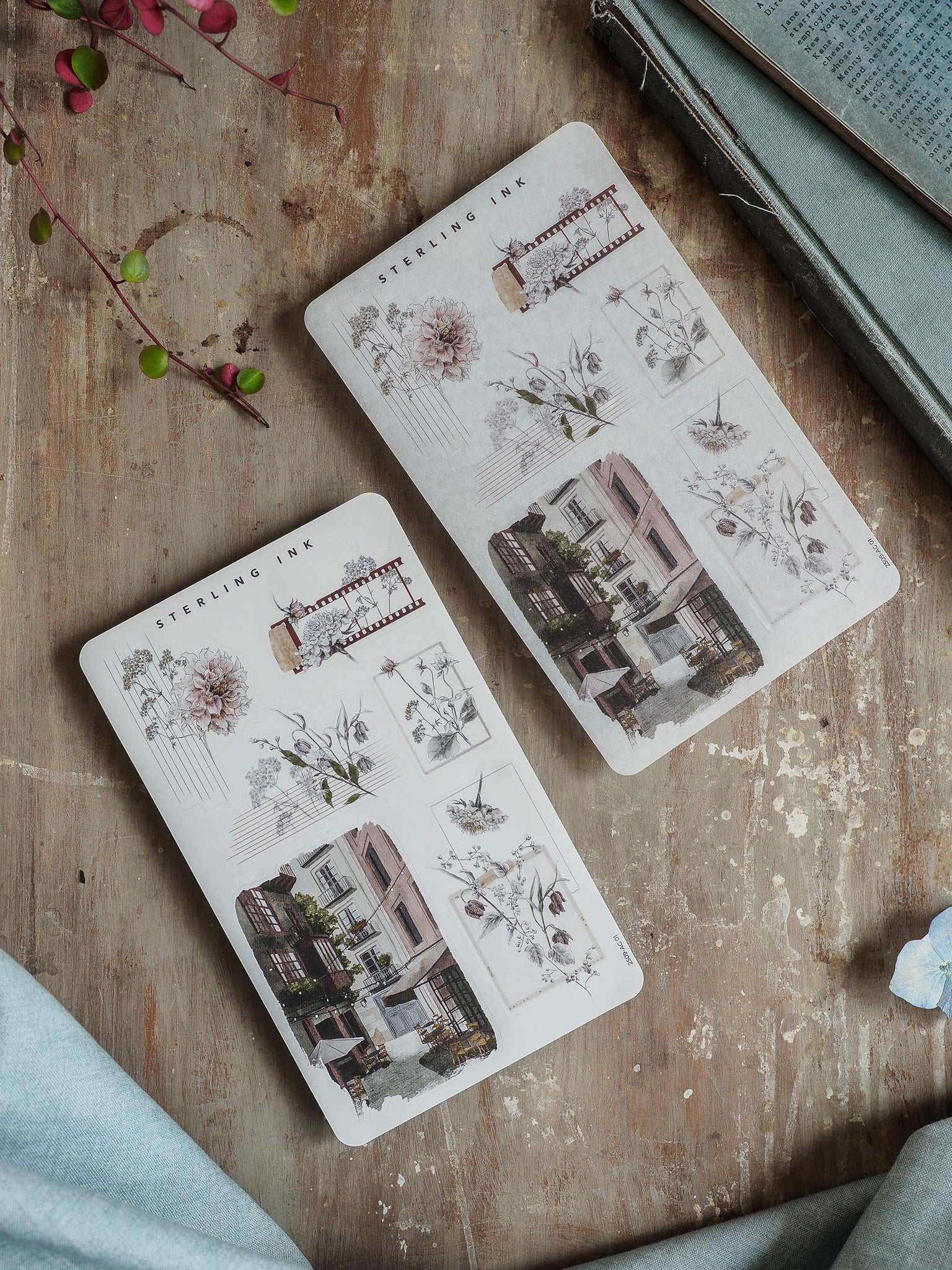Vintage botanical and architectural sketch stickers featuring detailed black line art of buildings and florals for scrapbooking, titled 'Arrangement Stickers - September 2025'.