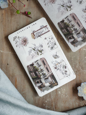 Detailed sticker sheet featuring vintage botanical illustrations and elegant Parisian architectural drawings for September 2025 planning.