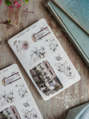 Vintage sticker sheets featuring intricate botanical arrangements and detailed black-and-white architectural sketches, perfect for journaling and crafting.