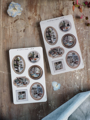 Vintage photo frame stickers featuring diverse shapes like ovals and circles, filled with scenic pictures and aged, distressed borders perfect for journaling.