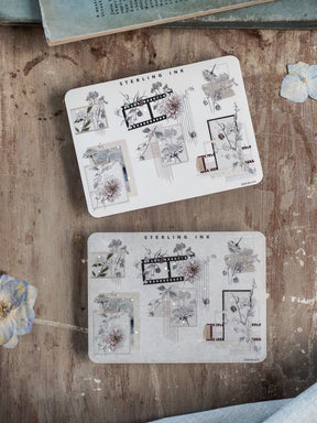 Delicate journaling sticker sheet with silver foil accents, showcasing various architectural corner and edge frames for planners and scrapbooking.