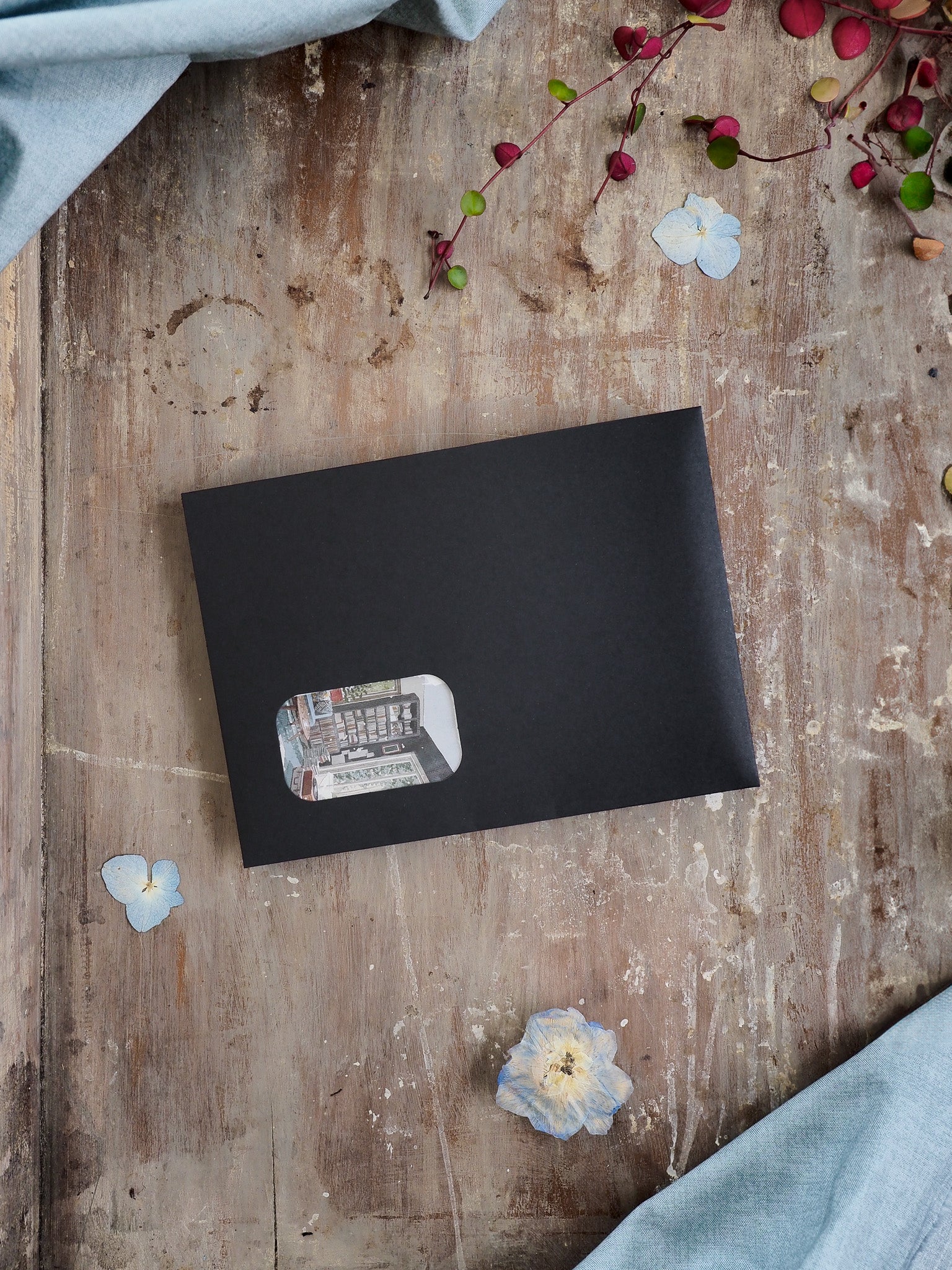 Sleek black subscription planner for September 2025, presenting a limited-quantity kit with minimalist printed details visible on the dark, matte cover.