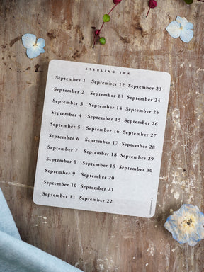 A white sticker sheet featuring a clean, organized September 2025 calendar grid printed with elegant black lettering, ideal for themed journaling and date planning.
