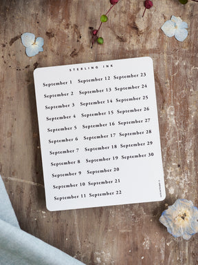 Minimalist sticker sheet featuring September 2025 dates, printed in elegant black typography on a clean white background for seamless journaling organization.