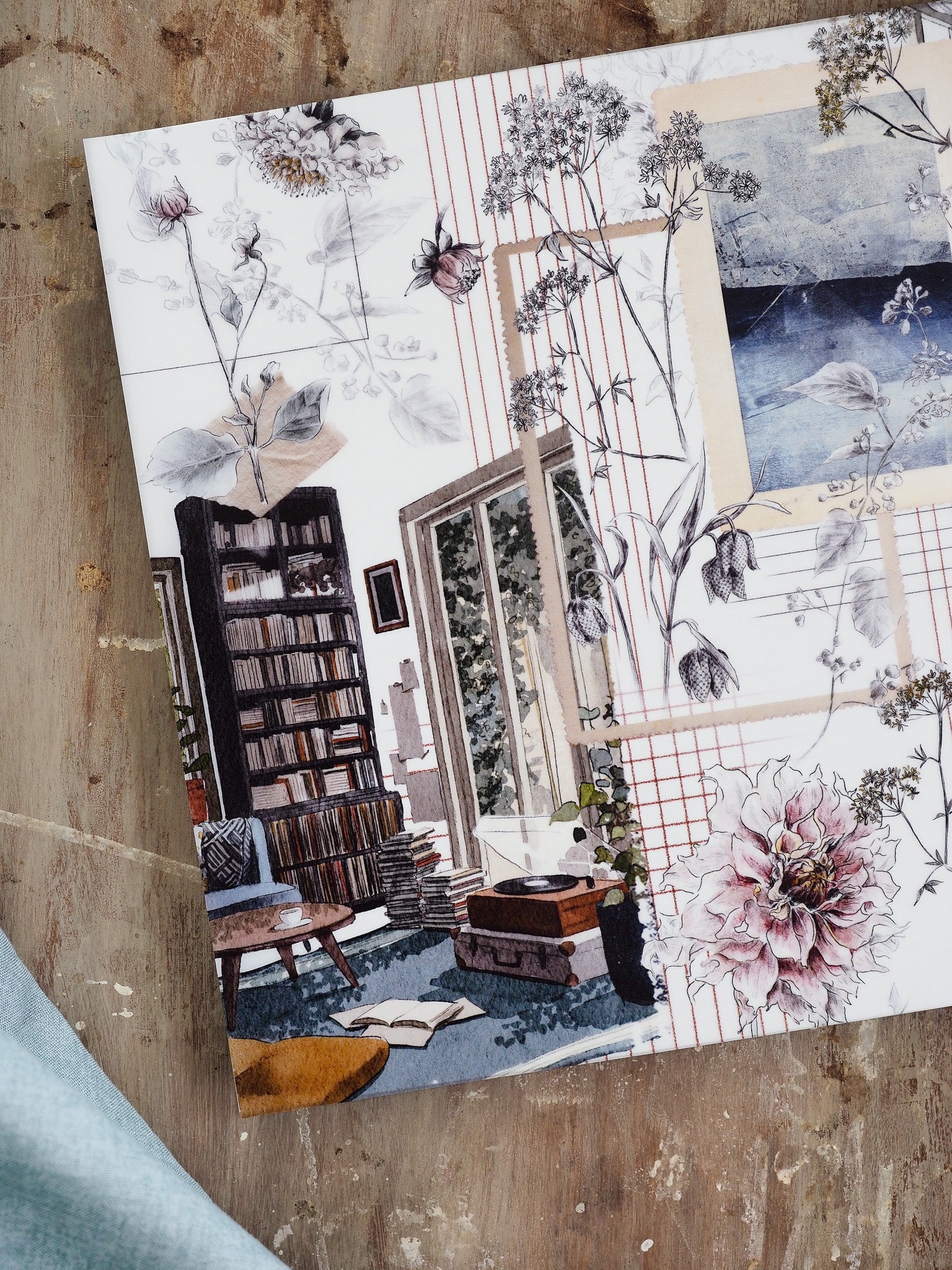 Vellum - September 2025 planner featuring a vintage botanical collage with layered flowers, stacked books, and delicate watercolor sketches.