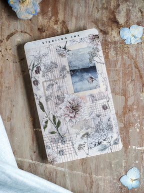 Botanical deco sheet for September 2025, featuring vintage illustrations of peonies and foliage printed on a delicate sepia-toned grid pattern.