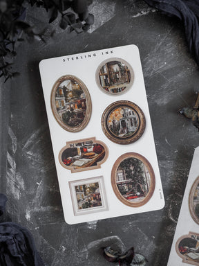 Ornate vintage sticker set featuring antique picture frames displaying moody, historical street scenes perfect for crafting seasonal photo collages.