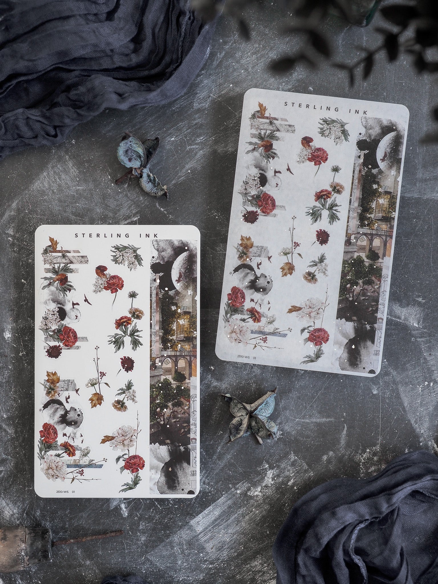 Vintage washi sticker sheets featuring detailed botanical illustrations of deep red roses, lush foliage, and antique architectural vignettes.
