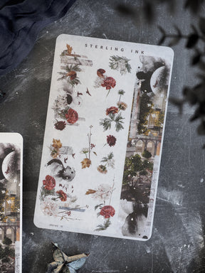 Moody autumn washi sticker sheet for October, featuring gothic botanical illustrations of deep red roses, skulls, and decaying cityscape elements.