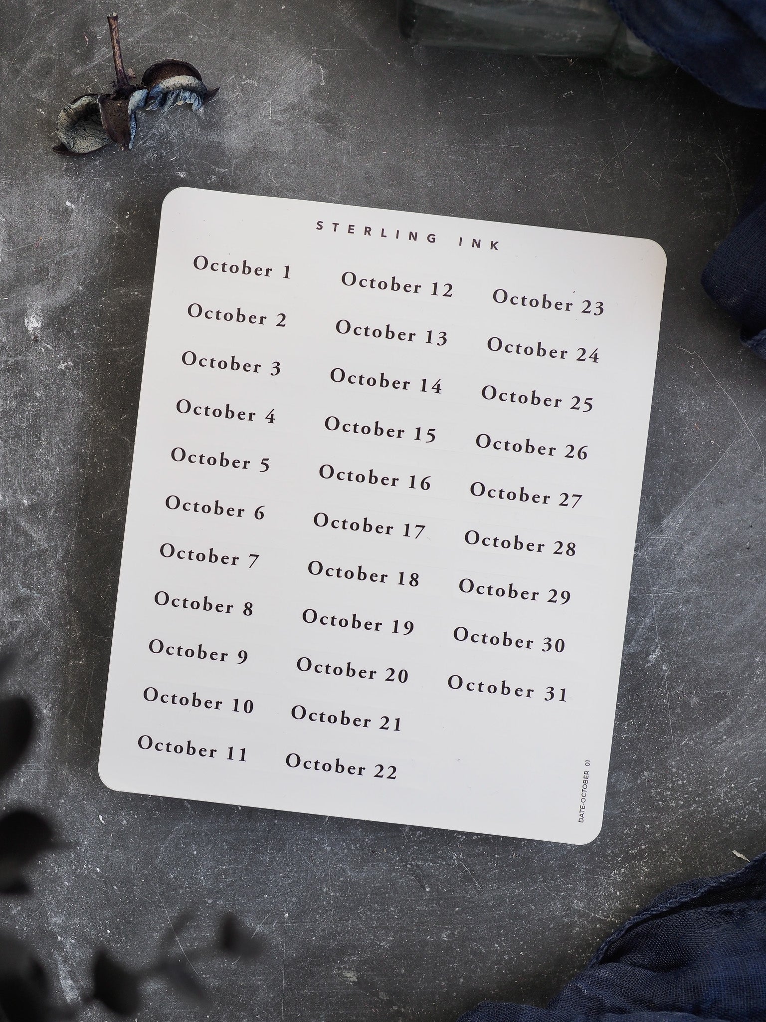 Printable sticker sheet displaying October 2025, with clear, organized black dates formatted in three clean columns on white cardstock for easy planning.
