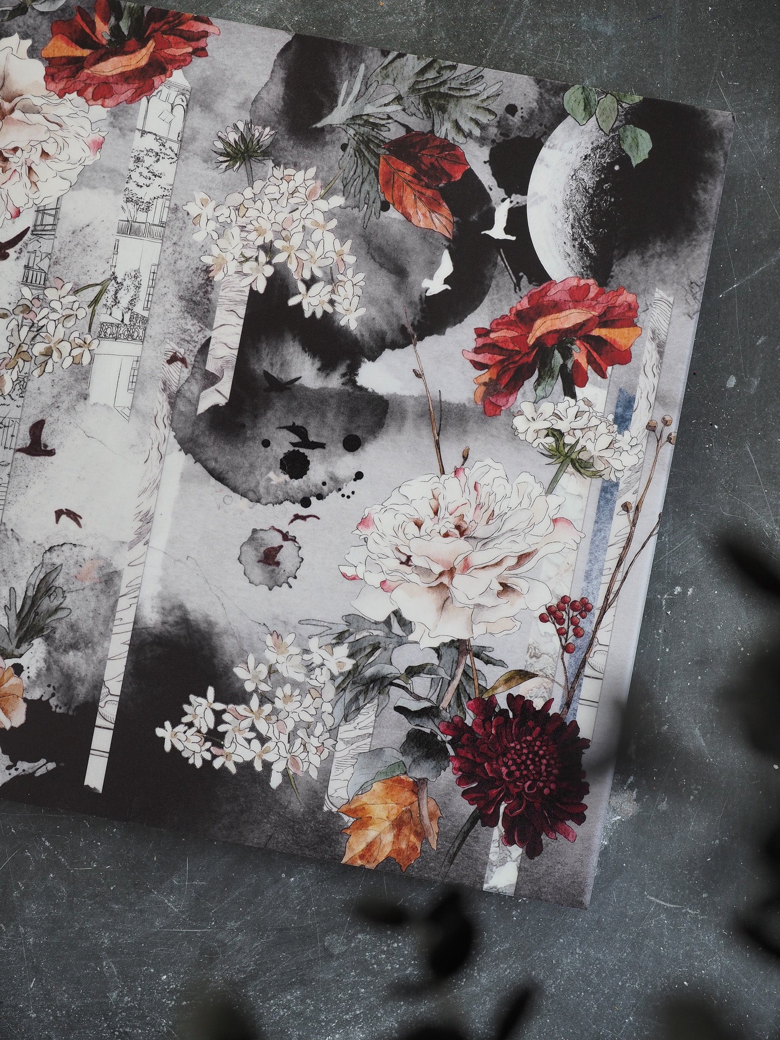 Vibrant autumnal planner cover featuring dramatic watercolor peonies, small white blossoms, and richly colored red and orange fall foliage.