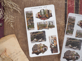 Sheet of vintage torn paper stickers featuring richly colored autumnal scenes, including distressed illustrations of old storefronts and cozy seasonal vignettes.
