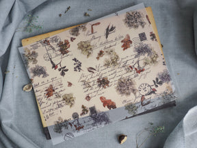 Vintage October 2023 stationery featuring sepia-toned botanical illustrations, handwritten text, and scattered autumnal elements perfect for journaling and scrapbooking.
