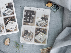Detailed vintage illustration stickers featuring sepia-toned antique typewriters, open journals, and literary elements like "Sterling Ink" and antique stationery.