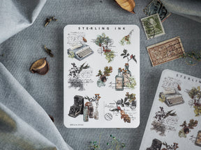 Whimsical sticker sheet featuring a collage of vintage scientific illustrations, botanical cuttings, antique typewriters, and stamps themed around "STERLING INK."