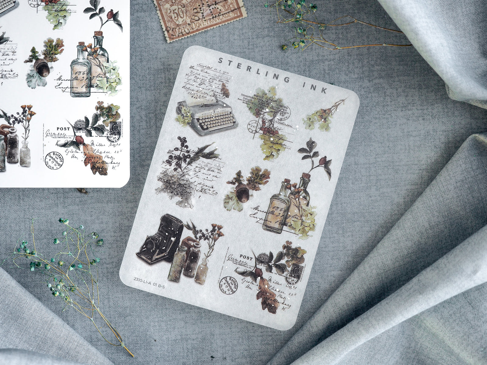 Set of large, decorative sticker icons titled "Sterling Ink," featuring vintage botanical elements, apothecary bottles, and antique scientific illustrations.