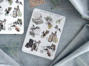 Set of large, decorative sticker icons titled "Sterling Ink," featuring vintage botanical elements, apothecary bottles, and antique scientific illustrations.