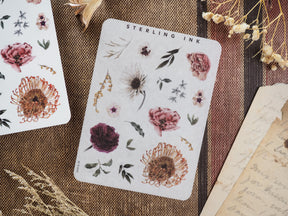 Muted botanical sticker elements featuring deep burgundy, blush pink, and earthy tones, perfect for decorating journals with realistic watercolor flowers and leaves.