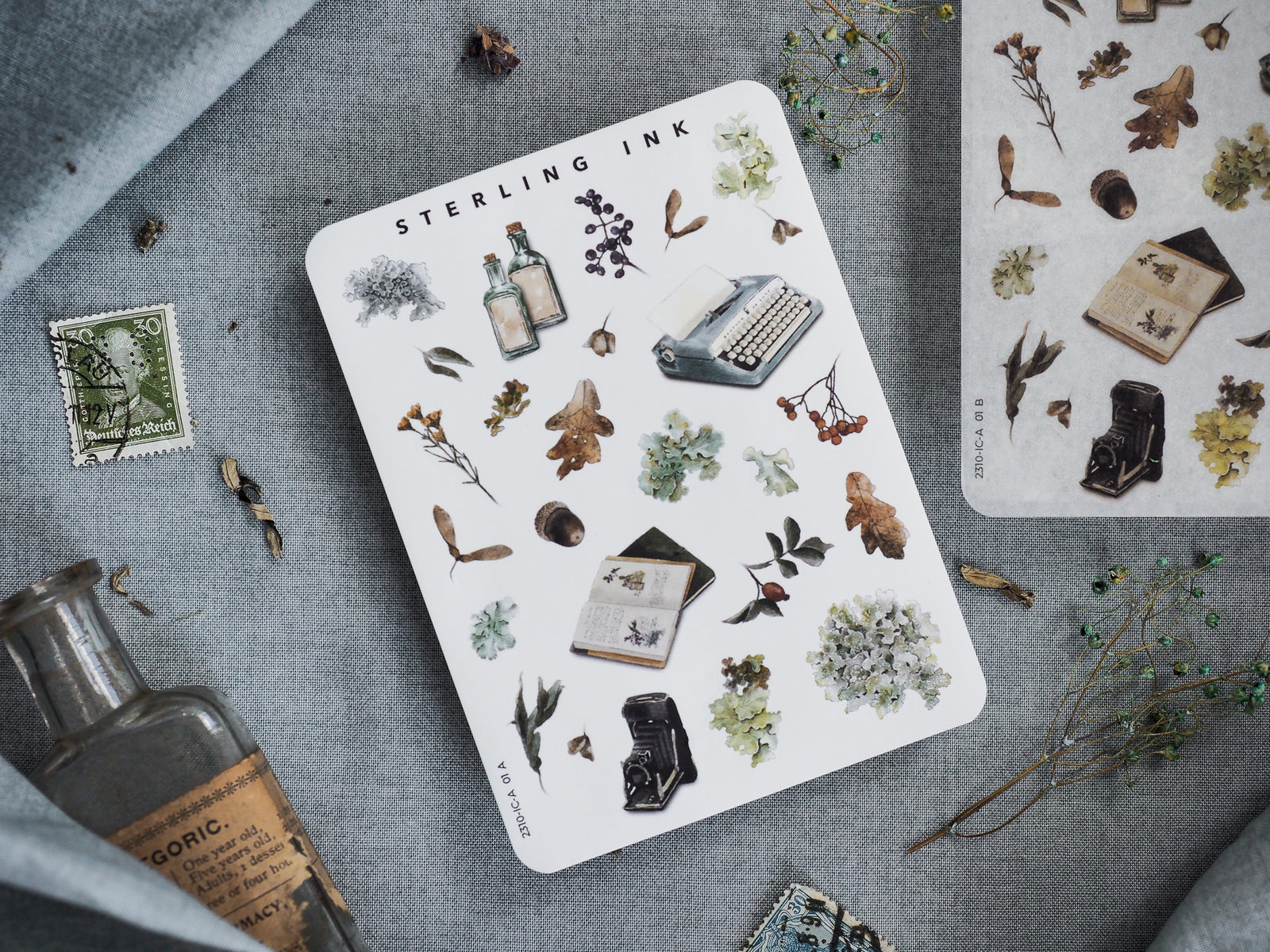 Mini Elements Icon Stickers set featuring a variety of autumnal, botanical designs like dried leaves, pressed flowers, small typewriter elements, and vintage natural objects.