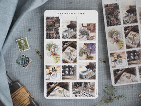 Vintage, sepia-toned sticker sheet featuring dozens of antique postage stamp designs depicting detailed, aged architectural scenes and historic city streetscapes.