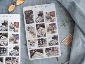 Grid sticker sheet showcasing rustic, sepia-toned vintage postage stamps and antique, weathered scenes, ideal for nostalgic craft journaling.