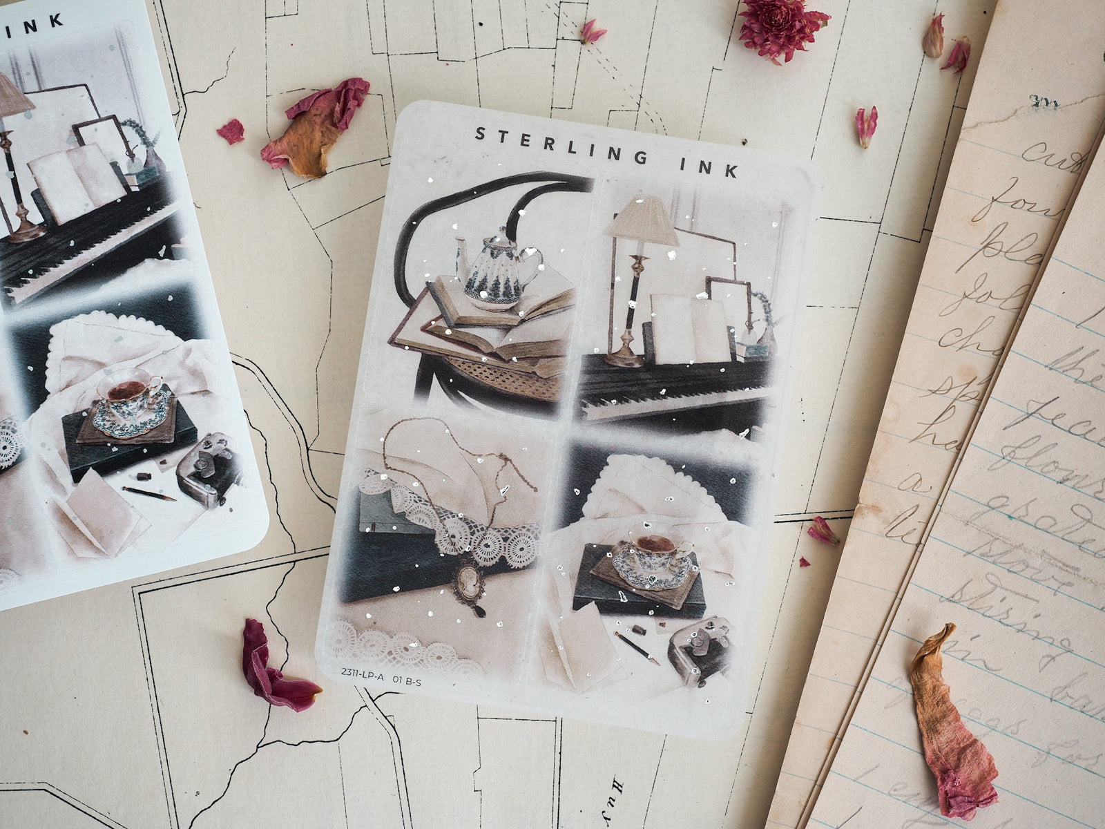 Monochromatic illustration stickers featuring vintage apothecary objects, decorative lace patterns, and antique motifs, printed with a detailed, elegant style.