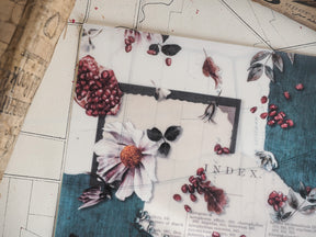 Vintage botanical index art featuring a cream flower, maroon berries, and dark leaves, arranged with scholarly Latin names on an aged paper design for journaling.