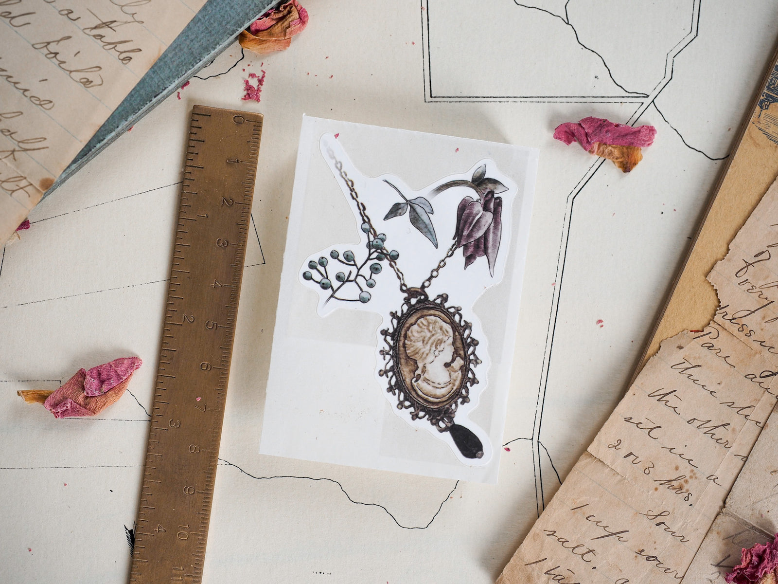 Set of botanical vinyl stickers featuring an antique, ornate photo frame surrounded by pressed leaves and delicate lavender sprigs.