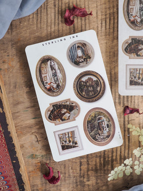 Set of vintage sticker sheets featuring ornate, brown-rimmed picture frames with distressed architectural scenes, perfect for crafting and journaling.