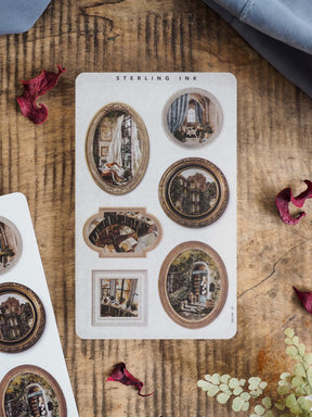Vintage sticker sheet featuring multiple sepia-toned picture frames with detailed architectural and nostalgic indoor scenes, ideal for scrapbooking or journaling.