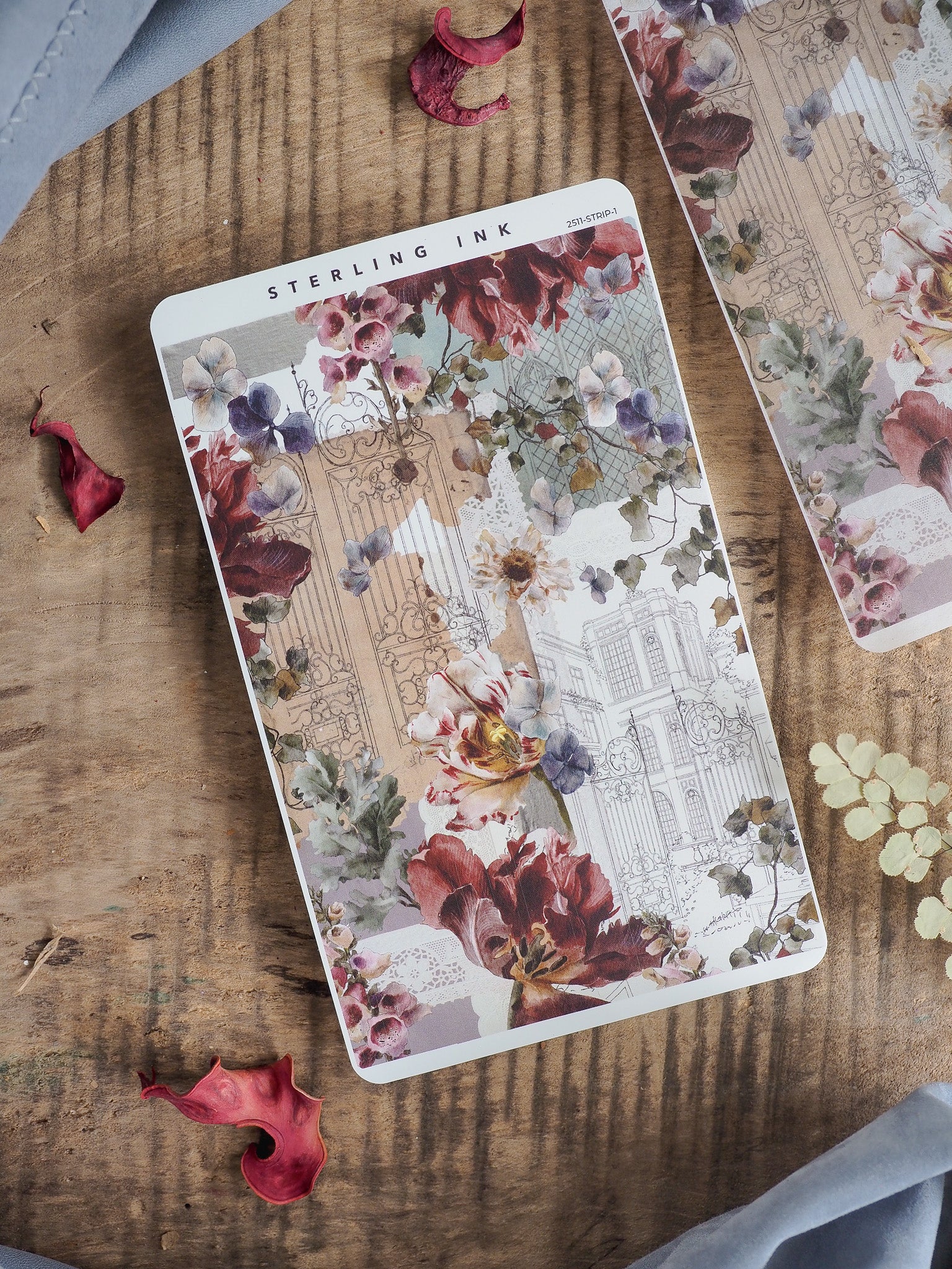 Elegant sticker sheet featuring a dramatic, vintage motif of burgundy and plum flowers, lush green foliage, and detailed antique architectural sketches.