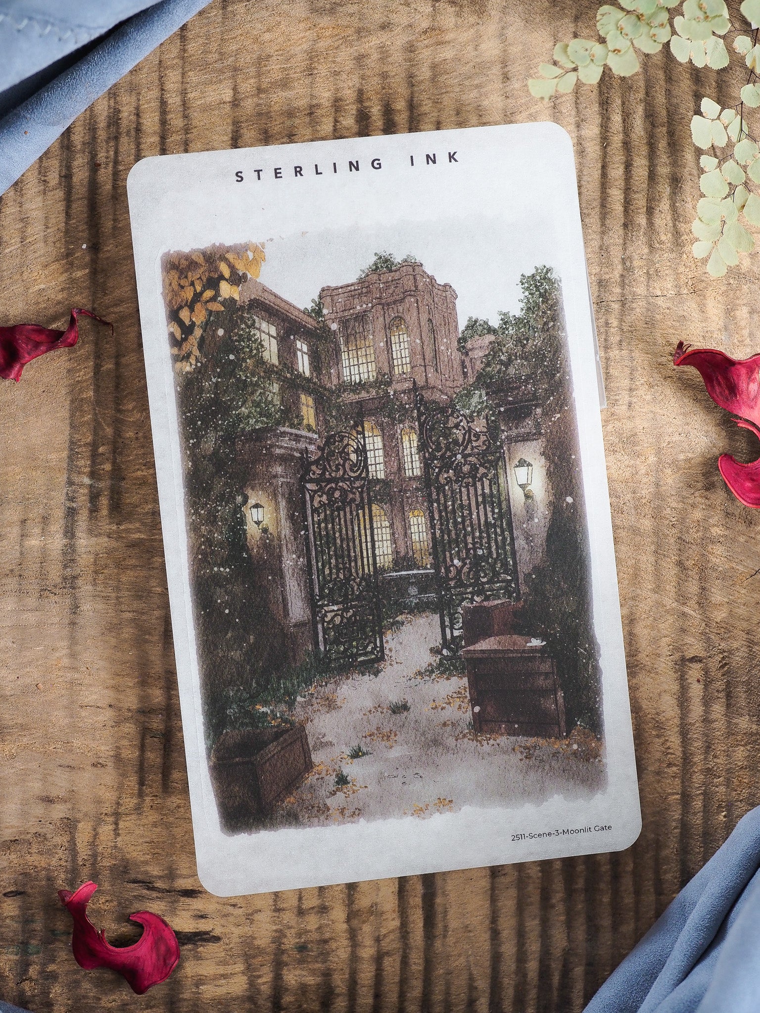 Detailed, sepia-toned illustration of a mysterious, overgrown iron gate and the facade of an aged, gothic entrance scene, perfect for crafting or journaling.