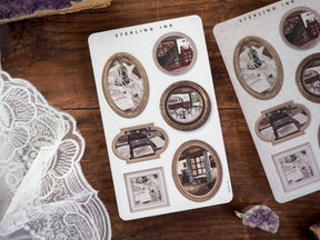 Rustic picture frame stickers for November 2024, featuring vintage, distressed borders and charming snowy scenes of historic city streets.
