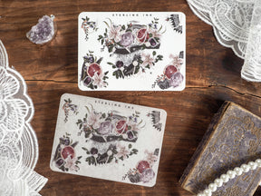 Elegant botanical stickers featuring clusters of deep purple and dusty rose roses interspersed with detailed green foliage and vintage floral patterns.