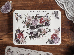 The sticker sheet features rich, autumnal floral clusters of peonies and grapes, accented by muted berries and delicate silver foil corners.