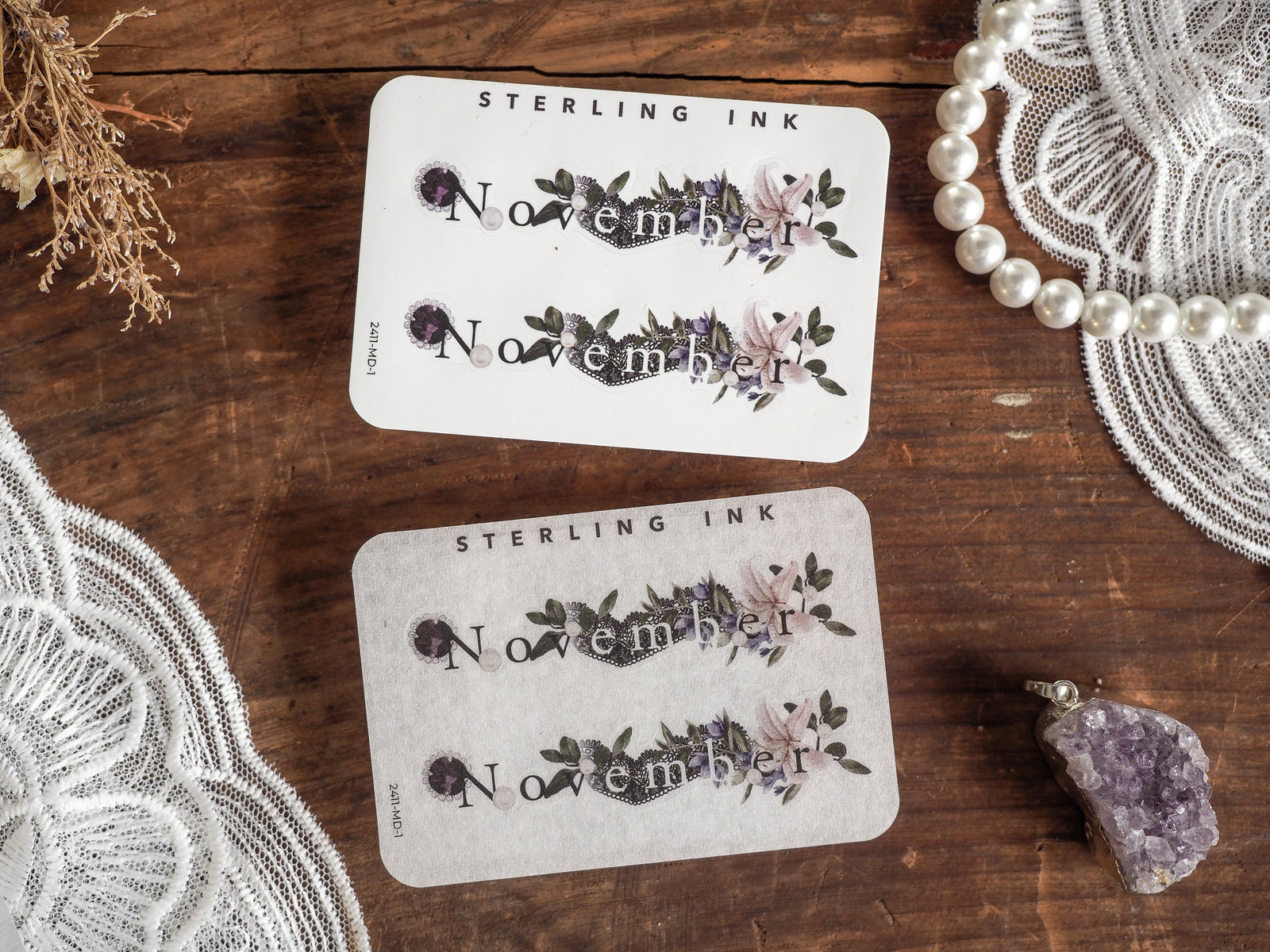 November month planner stickers featuring soft watercolor floral wreaths in dusty lavender, blush pink, and muted greenery.