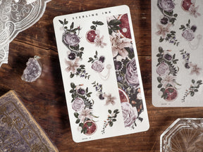 Elegant washi strips featuring a rich botanical pattern of muted vintage roses, lush greenery, and rustic floral elements.