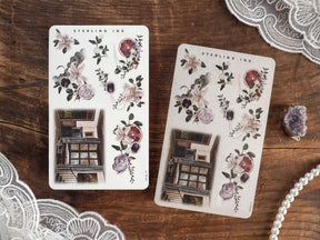 Elegant sticker sheet arrangements featuring vintage watercolor roses, delicate greenery, and a detailed window illustration, perfect for November 2024 planning.