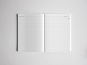 Open undated diary showing two white, gridded pages, offering structured graph paper lines perfect for comprehensive journaling, planning, and note-taking.