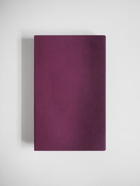 Solid deep magenta A5 notebook featuring a smooth, minimalist cover with no visible patterns or text.