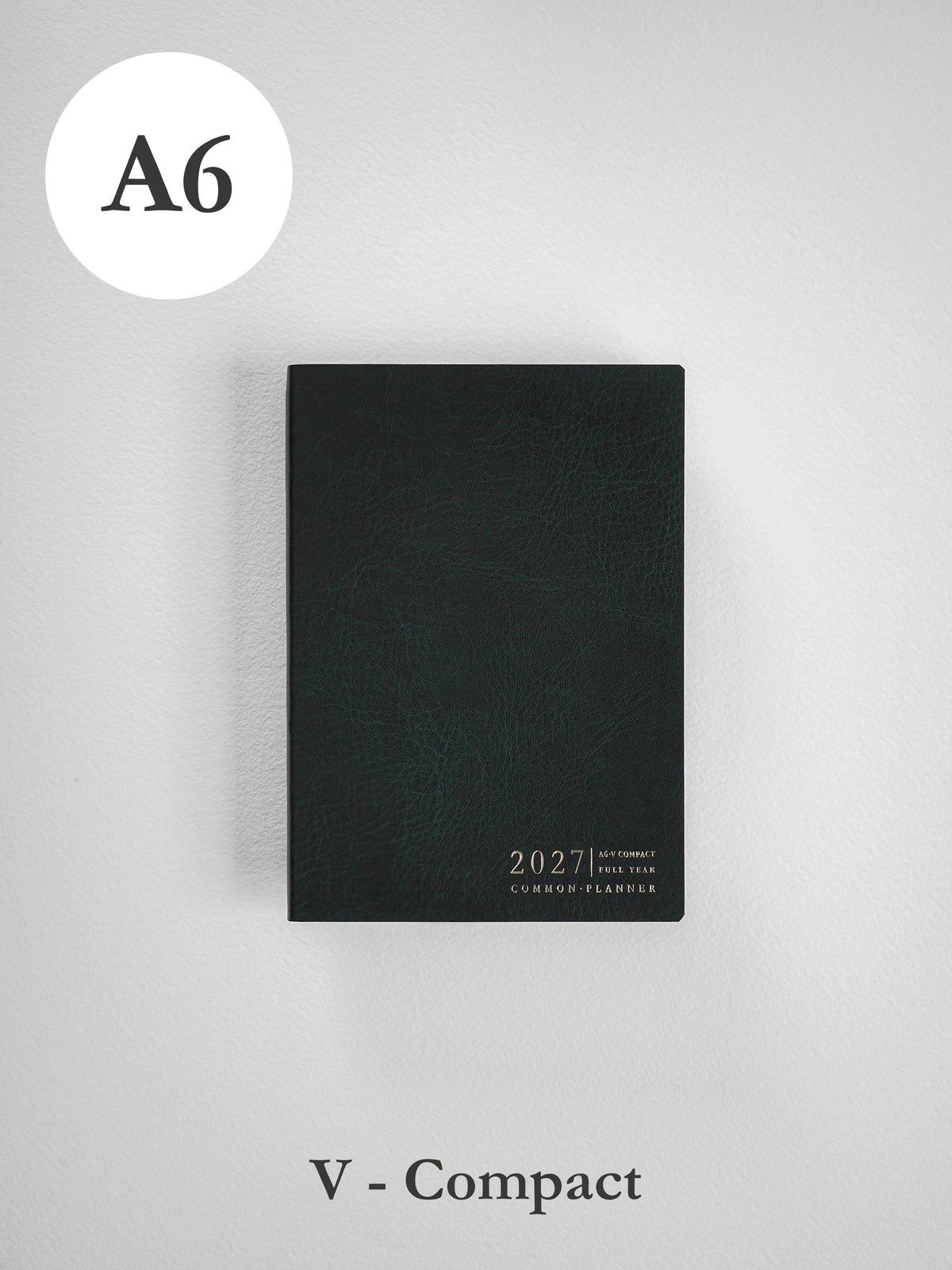 2027 A6 Vertical Compact planner front cover in Forest #color_forest