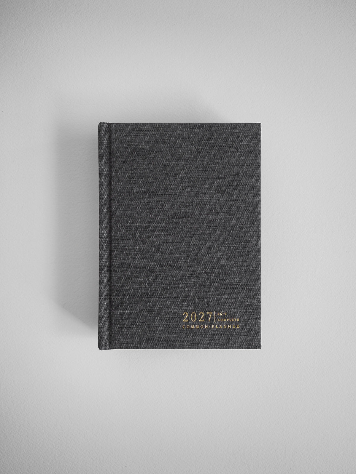 2027 A6 Vertical Complete planner interior layout in Charcoal #color_charcoal